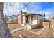 Charming home exterior with brick chimney and inviting front porch at 1517 W Nevada Pl, Denver, CO 80223