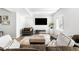 Finished basement featuring cozy seating, a large television, and a relaxing atmosphere at 17786 W 86Th Ln, Arvada, CO 80007