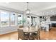 Elegant dining room with a view, open to the kitchen, perfect for entertaining at 17786 W 86Th Ln, Arvada, CO 80007