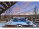 Outdoor hot tub with stunning views of the landscape at sunset at 17786 W 86Th Ln, Arvada, CO 80007