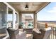 Relaxing outdoor patio with comfortable seating and scenic views at 17786 W 86Th Ln, Arvada, CO 80007