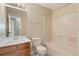 Bathroom featuring neutral tones, tiled floors, and shower/tub combo at 12784 Jasmine St # E, Thornton, CO 80602