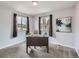 Cozy home office with a large desk, chair, and modern decor at 6065 Wadsworth Blvd # A, Arvada, CO 80003