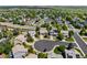 Wide aerial view of a beautiful neighborhood featuring houses, streets, and lush green trees at 19771 E Wesley Pl, Aurora, CO 80013
