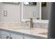 Close up of neutral bathroom featuring white countertops and updated fixtures at 19771 E Wesley Pl, Aurora, CO 80013