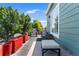 Relaxing outdoor patio with comfortable seating and vibrant potted plants at 19771 E Wesley Pl, Aurora, CO 80013