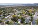 Scenic aerial view of a neighborhood with mature trees and well-maintained streets at 1882 S Zinnia Way, Lakewood, CO 80228