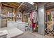 Unfinished basement with laundry area, washer, and dryer at 9365 W 80Th Pl # C, Arvada, CO 80005