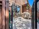Patio area with grill, furniture, and sliding door into home at 9365 W 80Th Pl # C, Arvada, CO 80005
