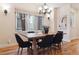 Formal dining room with hardwood floors and a wood table at 1907 S Columbine St, Denver, CO 80210