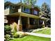 Charming two-story home with a well-manicured lawn and beautiful landscaping, offering great curb appeal at 1907 S Columbine St, Denver, CO 80210