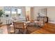 Bright living room showcasing modern furniture, large window, stylish decor, and wood flooring at 1907 S Columbine St, Denver, CO 80210