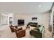 Inviting living room with comfortable seating, accent wall, and modern decor at 3643 White Rose Loop, Castle Rock, CO 80108