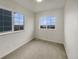 Bedroom with carpet, two windows and painted neutral color at 8199 Welby Rd # 1908, Denver, CO 80229