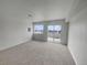 Spacious living room featuring neutral paint and carpet at 8199 Welby Rd # 1908, Denver, CO 80229