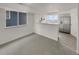 Open concept area with breakfast bar and stainless steel fridge at 8199 Welby Rd # 1908, Denver, CO 80229