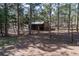 The horse barn with fenced area for exercise at 133 Mine Ln, Boulder, CO 80302