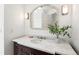 This bathroom features a marble vanity, modern mirror, and a white vessel sink at 133 Mine Ln, Boulder, CO 80302