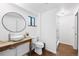 Modern bathroom features a vessel sink, wood vanity, and a tiled walk-in shower at 133 Mine Ln, Boulder, CO 80302