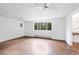 A well-lit bedroom with a ceiling fan and view to the outdoors at 133 Mine Ln, Boulder, CO 80302