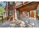 Large wooden deck and staircase that provides outdoor living space at 133 Mine Ln, Boulder, CO 80302