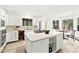 Spacious kitchen with a center island, stainless steel appliances, and bright lighting at 133 Mine Ln, Boulder, CO 80302