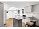 Bright kitchen with stainless steel appliances, ample counter space, a breakfast bar, and plenty of cabinets at 133 Mine Ln, Boulder, CO 80302