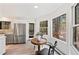 Bright breakfast nook in kitchen with stainless steel appliances and a scenic view at 133 Mine Ln, Boulder, CO 80302