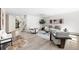 Bright and airy living room featuring modern decor, hardwood floors, and a staircase in view at 133 Mine Ln, Boulder, CO 80302