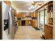 Well-equipped kitchen featuring stainless steel appliances, and a slider to the backyard at 2876 S Wolff St, Denver, CO 80236
