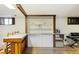 This home office features built in shelves, a desk and musical equipment at 2876 S Wolff St, Denver, CO 80236