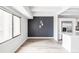 Open concept dining room with modern pendant lights, luxury vinyl plank flooring at 7877 E Mississippi Ave # 901, Denver, CO 80247