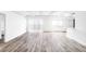 Spacious living room offering great natural light, LVP flooring, with access to the balcony at 7877 E Mississippi Ave # 901, Denver, CO 80247