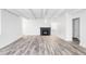Bright, open living area with fireplace and access to the rest of the home at 7877 E Mississippi Ave # 901, Denver, CO 80247