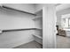 Walk-in closet with custom shelving for optimal storage and organization of clothing and accessories at 9066 Harlan St, Westminster, CO 80031