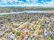 Gorgeous aerial view of the property showcasing its proximity to Sloan's Lake and the surrounding neighborhood at 2327 Lowell Blvd, Denver, CO 80211