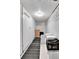 Basement storage area with carpet and boxes at 2327 Lowell Blvd, Denver, CO 80211