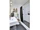 Chic bathroom with modern fixtures, white subway tile shower, and stylish decor at 2327 Lowell Blvd, Denver, CO 80211