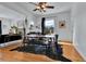 Spacious dining area with hardwood floors, a large dining table, and modern decor, perfect for entertaining guests at 2327 Lowell Blvd, Denver, CO 80211