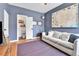 Cozy living room with couch and vintage decor at 2327 Lowell Blvd, Denver, CO 80211
