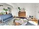 Bright living room with hardwood floors, modern furniture, and stylish decor, perfect for relaxing or entertaining at 2327 Lowell Blvd, Denver, CO 80211