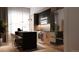 Elegant kitchen with a dark island, stainless steel appliances, and chic pendant lighting at 4817 W 10Th Ave, Denver, CO 80204