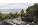 Relaxing rooftop deck with an outdoor grill and comfortable seating offering stunning city views at 4817 W 10Th Ave, Denver, CO 80204