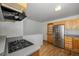 Modern kitchen with stainless steel refrigerator, ample cabinet space, and a gas range for cooking enthusiasts at 5502 E Center Ave, Denver, CO 80246