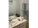 This bathroom is well lit, clean, and features decor that makes it feel like home at 7275 S Gaylord St # I09, Littleton, CO 80122