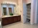 Bathroom features double vanity and a linen closet at 11207 Osage Cir # B, Northglenn, CO 80234