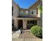 Charming townhome featuring a stone and siding exterior with well-maintained landscaping and inviting entryway at 11207 Osage Cir # B, Northglenn, CO 80234