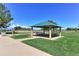 Outdoor pavilion with picnic tables in a community park, ideal for gatherings at 11207 Osage Cir # B, Northglenn, CO 80234