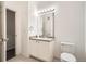 Bathroom with vanity, toilet and mirror at 18847 E Yale Cir # D, Aurora, CO 80013