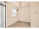 Small dining area with tile floors and a window at 18847 E Yale Cir # D, Aurora, CO 80013